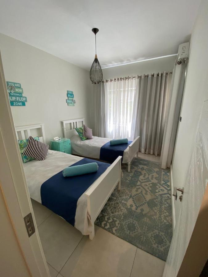 Beachcove Apartment 2 Pereybere Beach Esterno foto